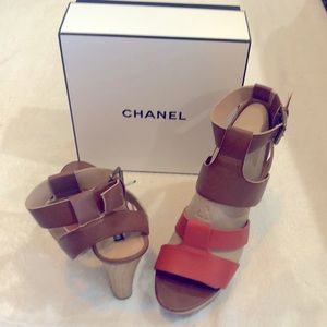 These  sandals are wooden wedgy with leather straps orange and caramel .